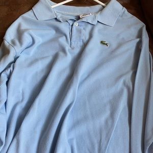It’s a Lacoste men’s sweater size 7